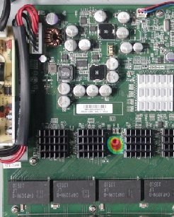 Populated circuit board with a heat map highlighting a missing component