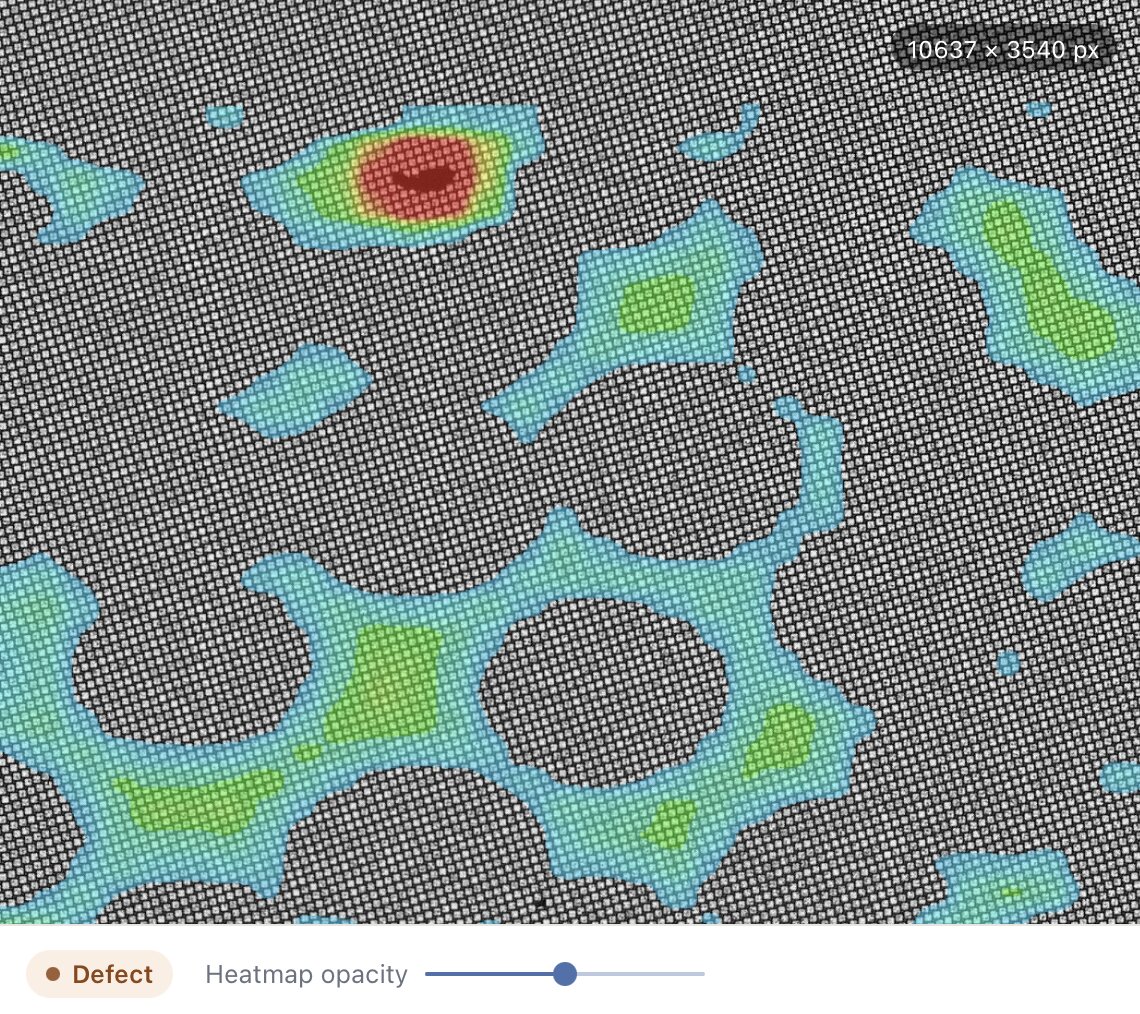 AI Validator result for Averian Spatial Detector: heatmap with the strongest red response on the dust inside the wafer, verdict Defect